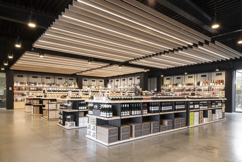 Side view of acoustic baffles in a beverage store