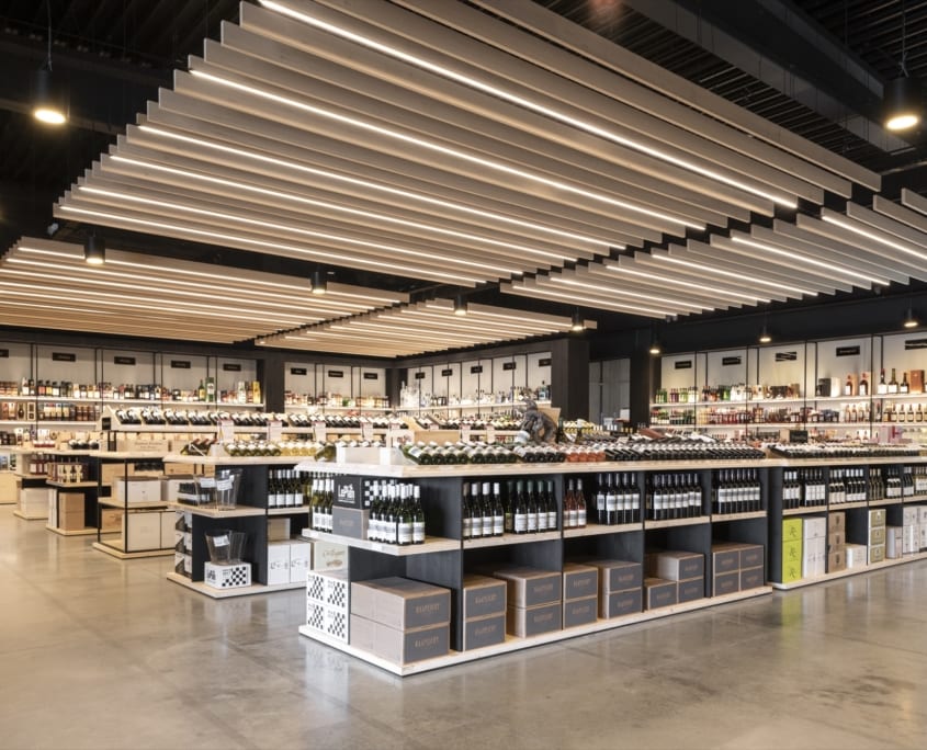 Side view of acoustic baffles in a beverage store